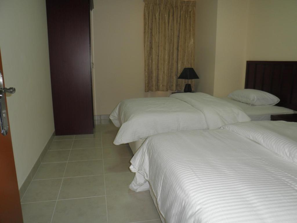 Hamasa Plaza Hotel Al Buraimi Chambre photo